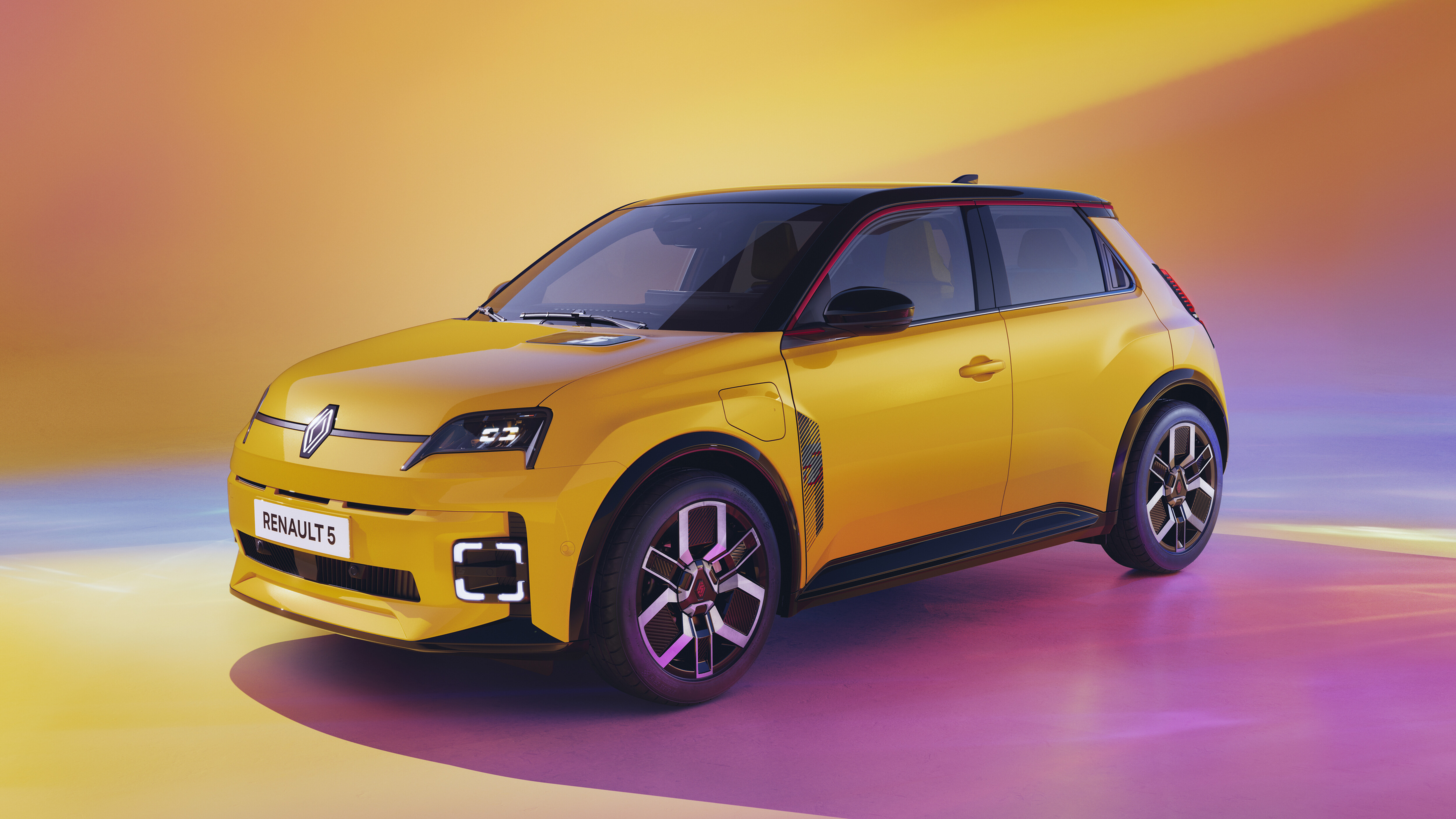 Ein gelber Renault 5 E-Tech.
