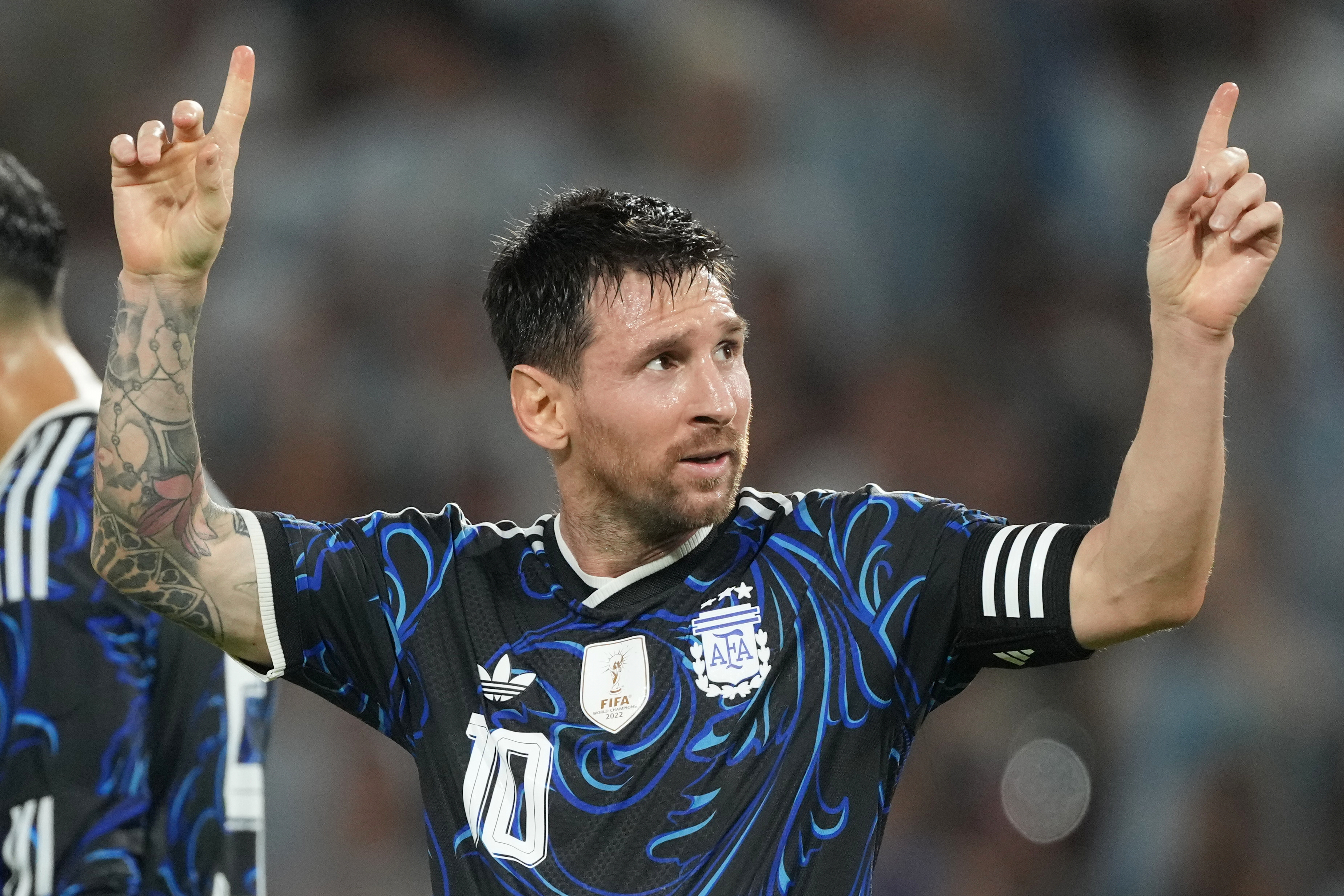 Lionel Messi celebrating for Argentina.