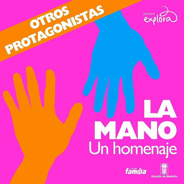 Ilustración. Dos manos salen, una de la parte superior de la imagen y otra de la parte inferior. En la parte derecha de la imagen texto que dice: "Otros protagonistas. La mano. Un homenaje".