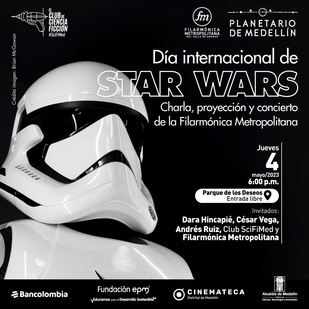 Foto. En la parte izquierda un soldado imperial de la saga la guerra de las galaxias. Parece un robot con un casco blanco. Sobre la imagen con fondo negro texto que dice: "Dia internacional de Star Wars, charla, proyección y convierto de la Filarmónica Metropolitana." Y más abajo: "Jueves 4 de mayo a las seis de la tarde en el Parque de los Deseos. Entrada libre. Invitados: Dara Hincapié, César Vega y Andrés Ruiz, Club SciFi Med y Filarmónica Metropolitana"